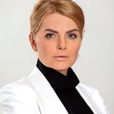 Олена Шуст